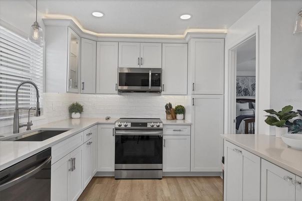 Interior, Kitchen, Pendant Lights, Recessed Lighting, Stainless Steel Appliances, Wood Texture Flooring