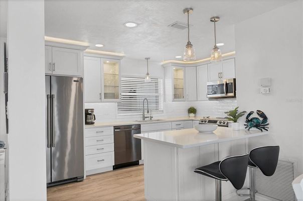 Interior, Kitchen, Pendant Lights, Recessed Lighting, Stainless Steel Appliances, Wood Texture Flooring