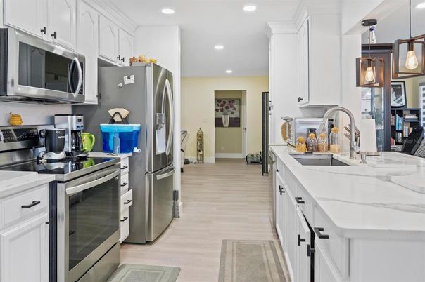 Interior, Kitchen, Pendant Lights, Recessed Lighting, Stainless Steel Appliances, Wood Texture Flooring