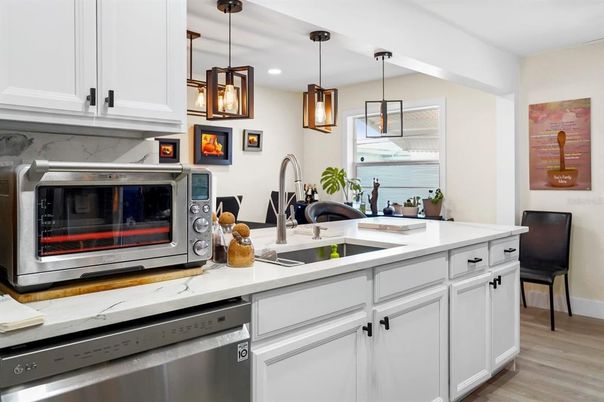 Interior, Kitchen, Pendant Lights, Recessed Lighting, Stainless Steel Appliances, Wood Texture Flooring