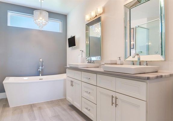 Bathroom, Dual Sink Vanities, Free Standing Baths, Interior, Pendant Lights, Wood Texture Flooring