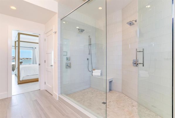 Bathroom, Bedroom, Glass Shower, Interior, Recessed Lighting, Water, Wood Texture Flooring
