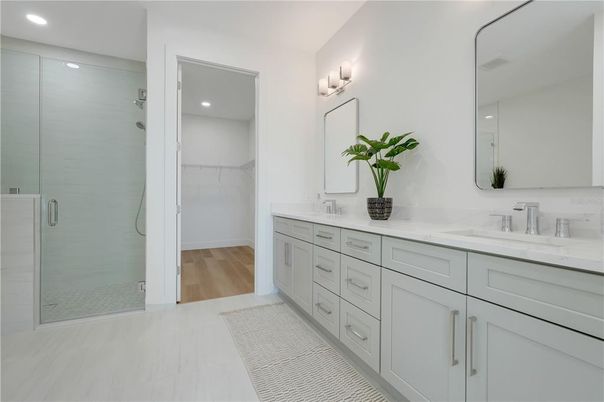 Bathroom, Dual Sink Vanities, Glass Shower, Interior, Recessed Lighting, Wood Texture Flooring