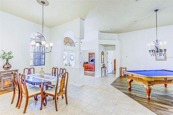 Billiard Table, Chandelier, Dining room, Game Room, Interior, Pendant Lights, Wood Texture Flooring