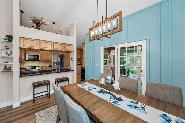 Dining room, Interior, Kitchen, Pendant Lights, Stainless Steel Appliances, Wood Texture Flooring