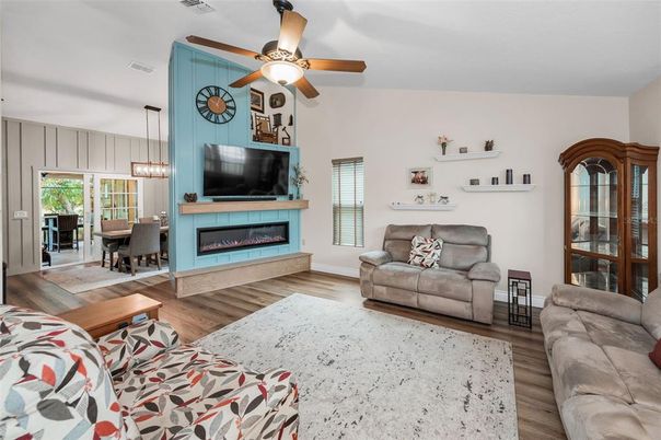 Dining room, Fireplace, Interior, Living room, Pendant Lights, Wood Texture Flooring
