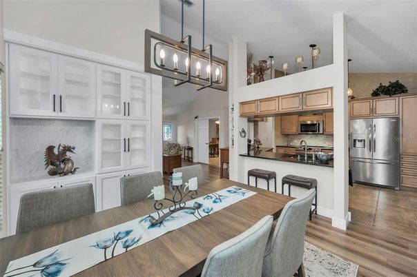 Dining room, Interior, Kitchen, Pendant Lights, Stainless Steel Appliances, Wood Texture Flooring