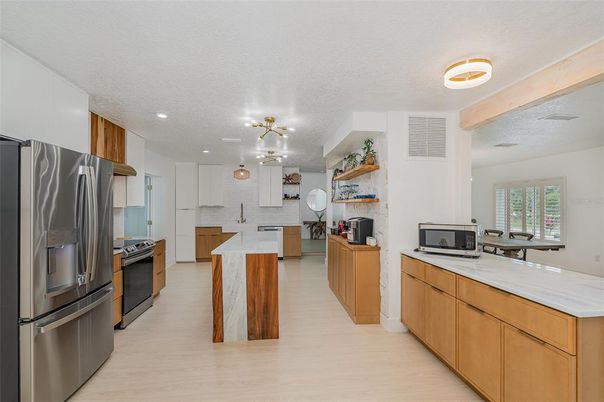 Interior, Kitchen, Pendant Lights, Recessed Lighting, Stainless Steel Appliances, Wood Texture Flooring