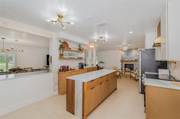 Dining room, Fireplace, Interior, Kitchen, Living room, Pendant Lights, Recessed Lighting, Wood Texture Flooring