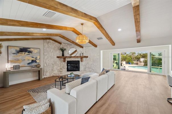 Fireplace, Interior, Living room, Pendant Lights, Recessed Lighting, Stone Walls, Wooden Beams, Wood Texture Flooring
