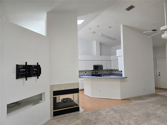 Fireplace, Interior, Kitchen, Recessed Lighting, Wood Texture Flooring
