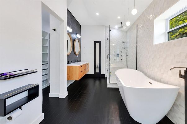 Bathroom, Dual Sink Vanities, Free Standing Baths, Glass Shower, Interior, Pendant Lights, Recessed Lighting, Wood Texture Flooring