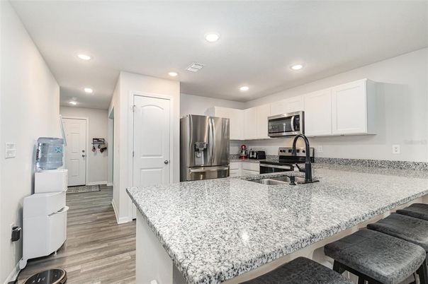 Interior, Kitchen, Recessed Lighting, Stainless Steel Appliances, Wood Texture Flooring