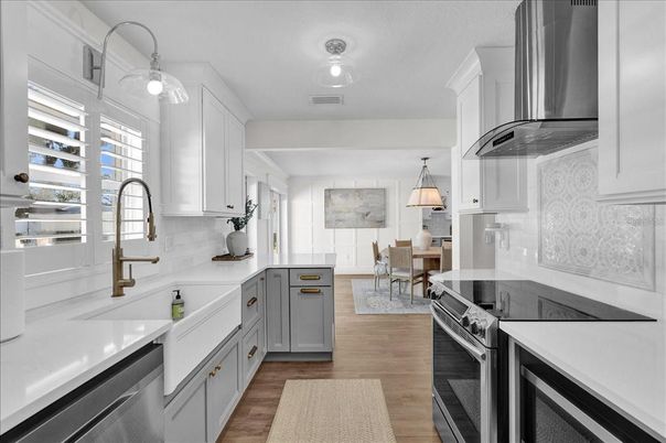 Dining room, Interior, Kitchen, Pendant Lights, Stainless Steel Appliances, Wood Texture Flooring