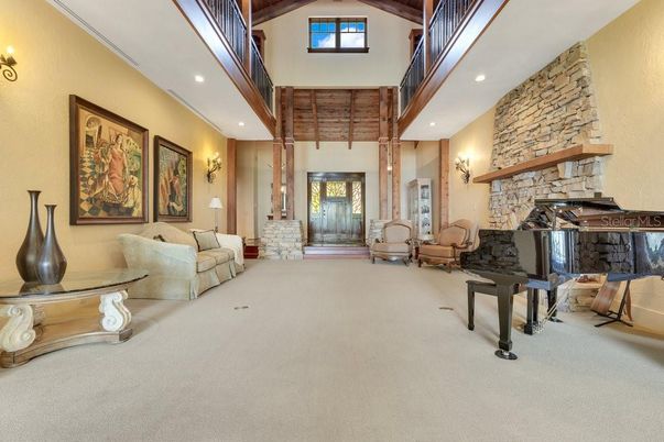 Fireplace, Interior, Living room, Piano, Recessed Lighting, Stone Walls