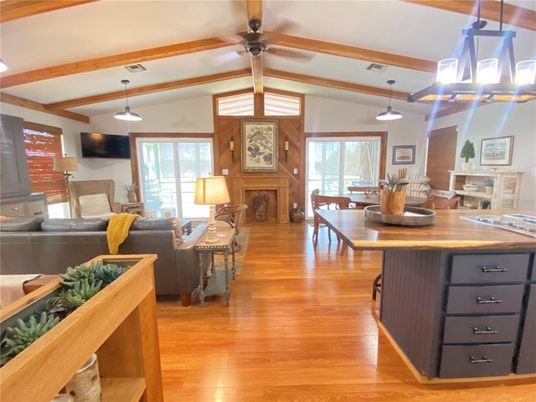 Dining room, Fireplace, Interior, Living room, Pendant Lights, Wooden Beams, Wood Texture Flooring