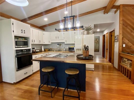 Interior, Kitchen, Pendant Lights, Recessed Lighting, Stainless Steel Appliances, Wooden Beams, Wood Texture Flooring