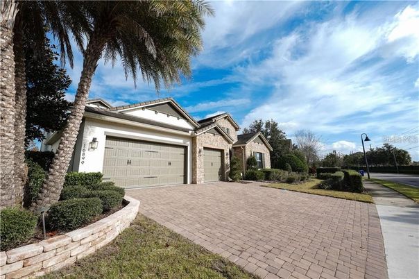 Attached, Exterior, Facade, Brick Facade, Mediterranean