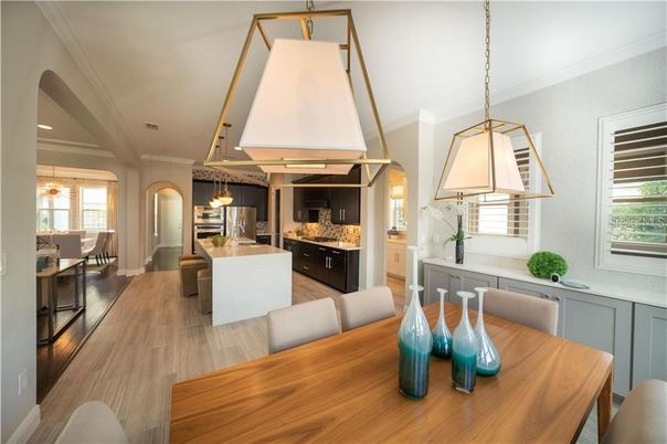 Dining room, Interior, Kitchen, Pendant Lights, Recessed Lighting, Stainless Steel Appliances, Wood Texture Flooring