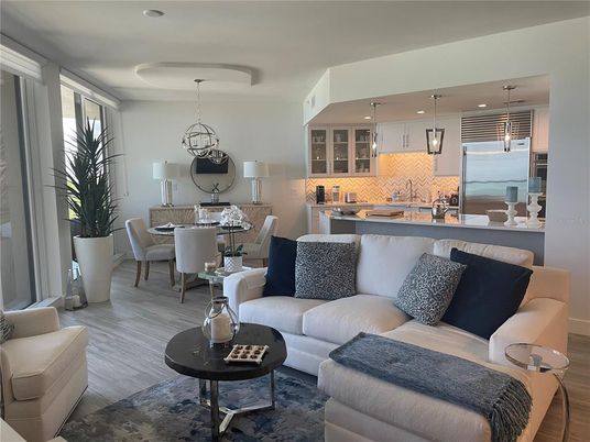 Dining room, Interior, Kitchen, Living room, Pendant Lights, Recessed Lighting, Stainless Steel Appliances, Wood Texture Flooring
