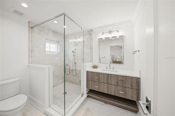 Bathroom, Dual Sink Vanities, Glass Shower, Interior, Marble, Recessed Lighting