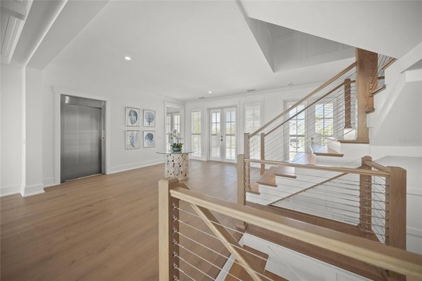 Elevator, Interior, Recessed Lighting, Wood Texture Flooring