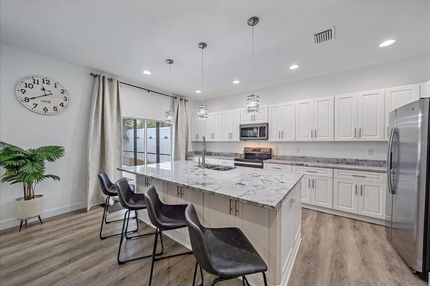 Interior, Kitchen, Pendant Lights, Recessed Lighting, Stainless Steel Appliances, Wood Texture Flooring