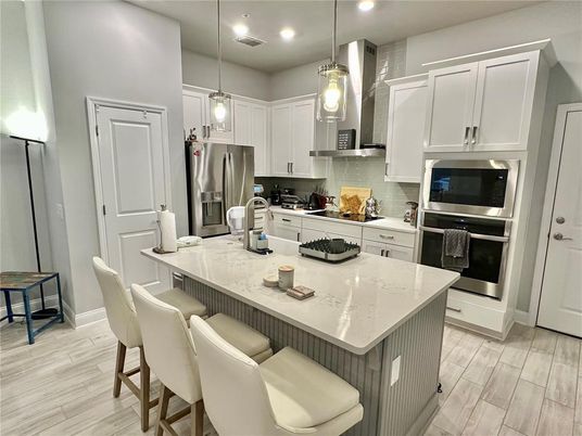 Interior, Kitchen, Pendant Lights, Recessed Lighting, Stainless Steel Appliances, Wood Texture Flooring