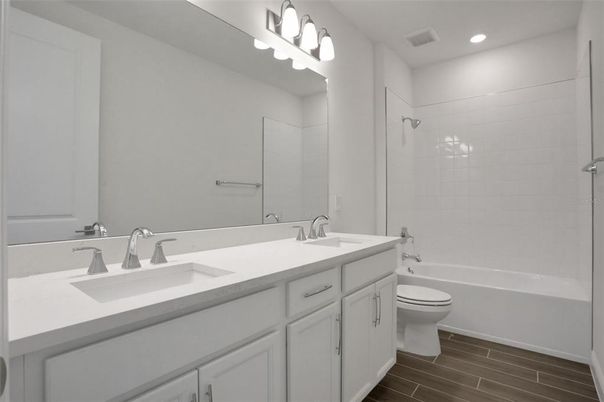 Bathroom, Dual Sink Vanities, Interior, Recessed Lighting, Wood Texture Flooring
