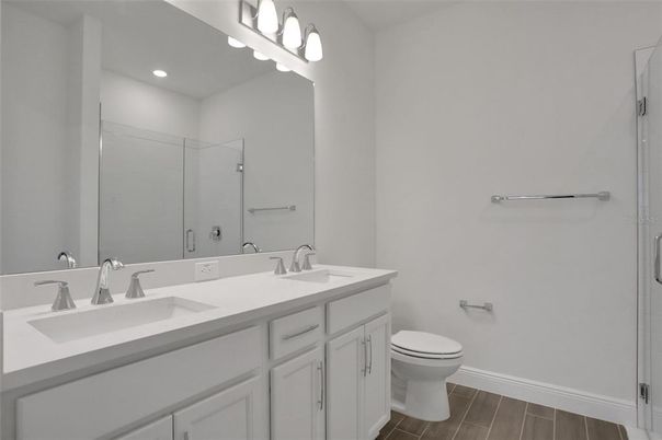 Bathroom, Dual Sink Vanities, Interior, Recessed Lighting, Wood Texture Flooring