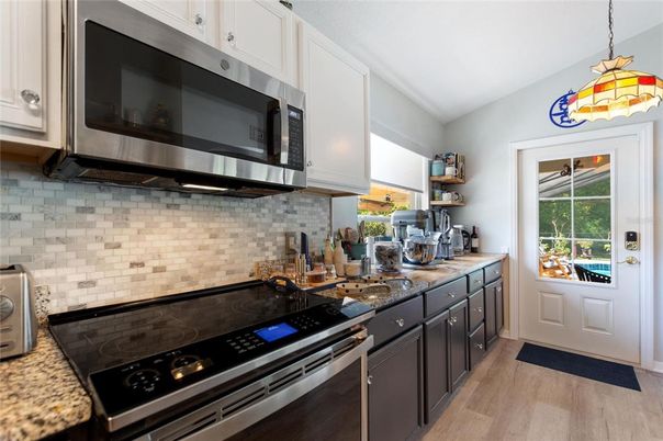Interior, Kitchen, Pendant Lights, Stainless Steel Appliances, Wood Texture Flooring