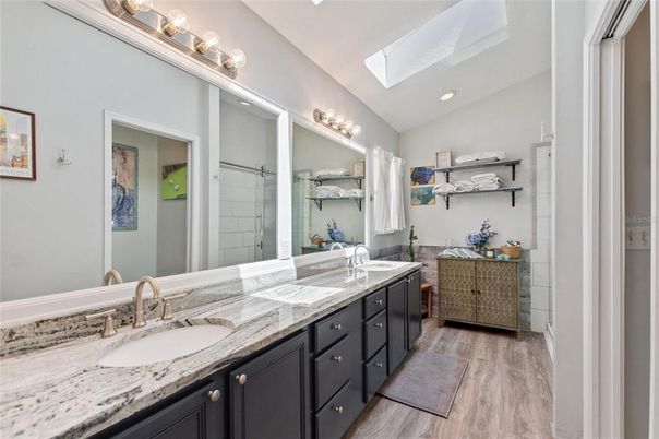 Bathroom, Dual Sink Vanities, Interior, Recessed Lighting, Wood Texture Flooring