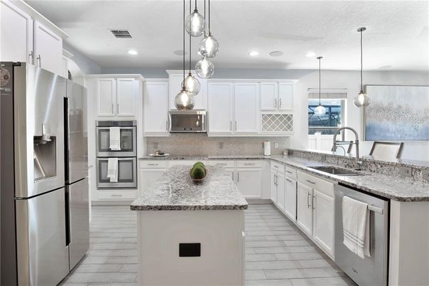 Interior, Kitchen, Pendant Lights, Recessed Lighting, Stainless Steel Appliances, Wood Texture Flooring