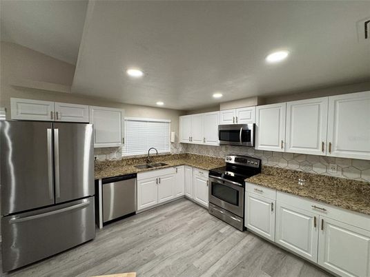 Interior, Kitchen, Recessed Lighting, Stainless Steel Appliances, Wood Texture Flooring