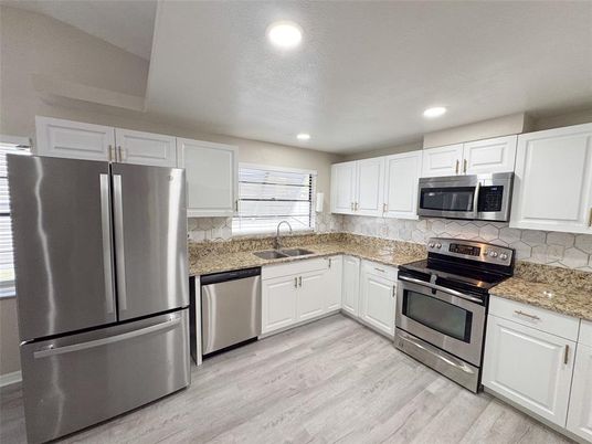 Interior, Kitchen, Recessed Lighting, Stainless Steel Appliances, Wood Texture Flooring