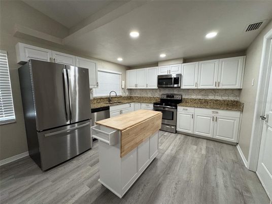 Interior, Kitchen, Recessed Lighting, Stainless Steel Appliances, Wood Texture Flooring