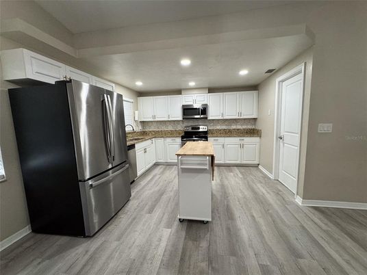 Interior, Kitchen, Recessed Lighting, Stainless Steel Appliances, Wood Texture Flooring