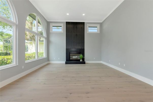 Empty room, Fireplace, Interior, Recessed Lighting, Wood Texture Flooring