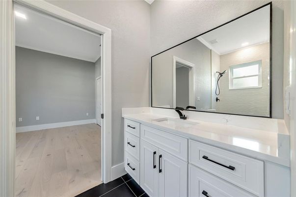 Bathroom, Dual Sink Vanities, Interior, Recessed Lighting, Wood Texture Flooring
