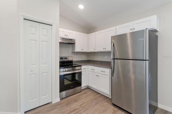 Interior, Kitchen, Recessed Lighting, Stainless Steel Appliances, Wood Texture Flooring