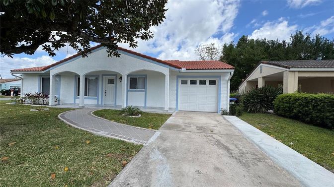Attached, Exterior, Facade, Spanish Mediterranean