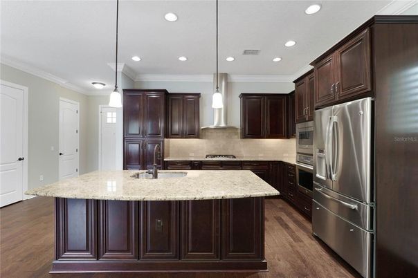 Interior, Kitchen, Pendant Lights, Recessed Lighting, Stainless Steel Appliances, Wood Texture Flooring