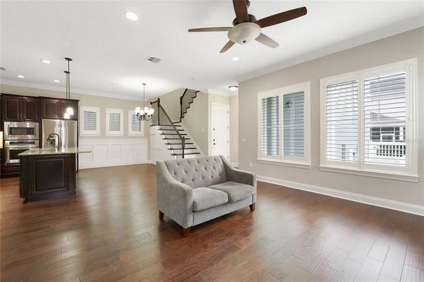 Chandelier, Interior, Kitchen, Pendant Lights, Recessed Lighting, Stainless Steel Appliances, Wood Texture Flooring