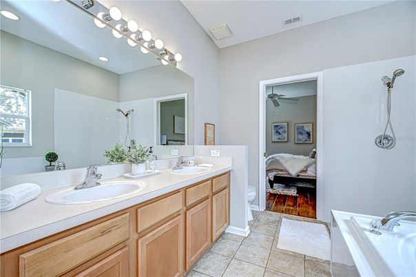 Bathroom, Dual Sink Vanities, Interior, Recessed Lighting, Wood Texture Flooring