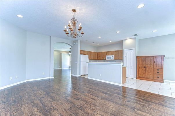 Chandelier, Empty room, Interior, Kitchen, Recessed Lighting, Wood Texture Flooring