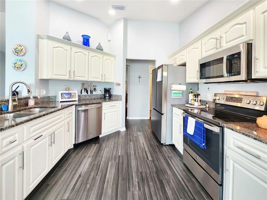 Interior, Kitchen, Recessed Lighting, Stainless Steel Appliances, Wood Texture Flooring