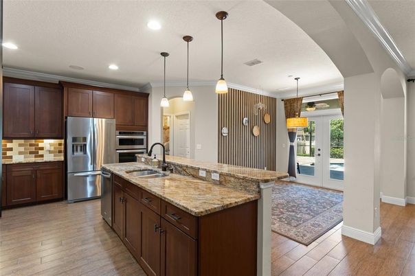 Interior, Kitchen, Pendant Lights, Recessed Lighting, Stainless Steel Appliances, Wood Texture Flooring