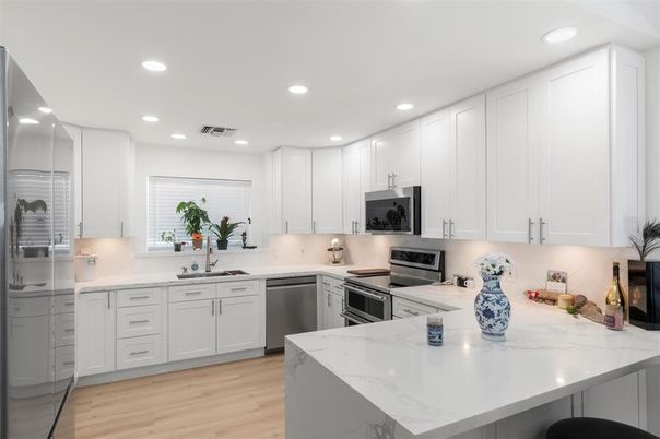 Interior, Kitchen, Recessed Lighting, Stainless Steel Appliances, Wood Texture Flooring