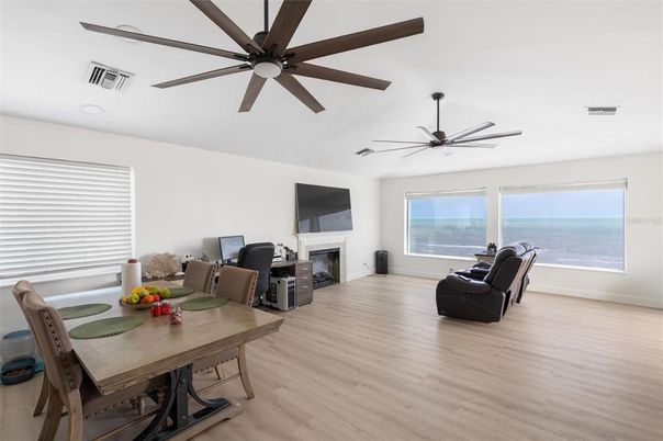 Dining room, Fireplace, Interior, Water, Wood Texture Flooring