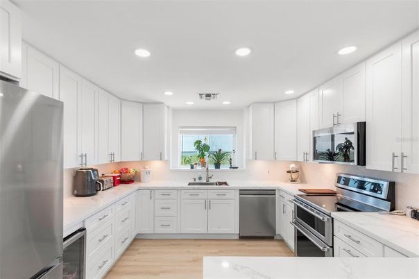 Interior, Kitchen, Recessed Lighting, Stainless Steel Appliances, Wood Texture Flooring